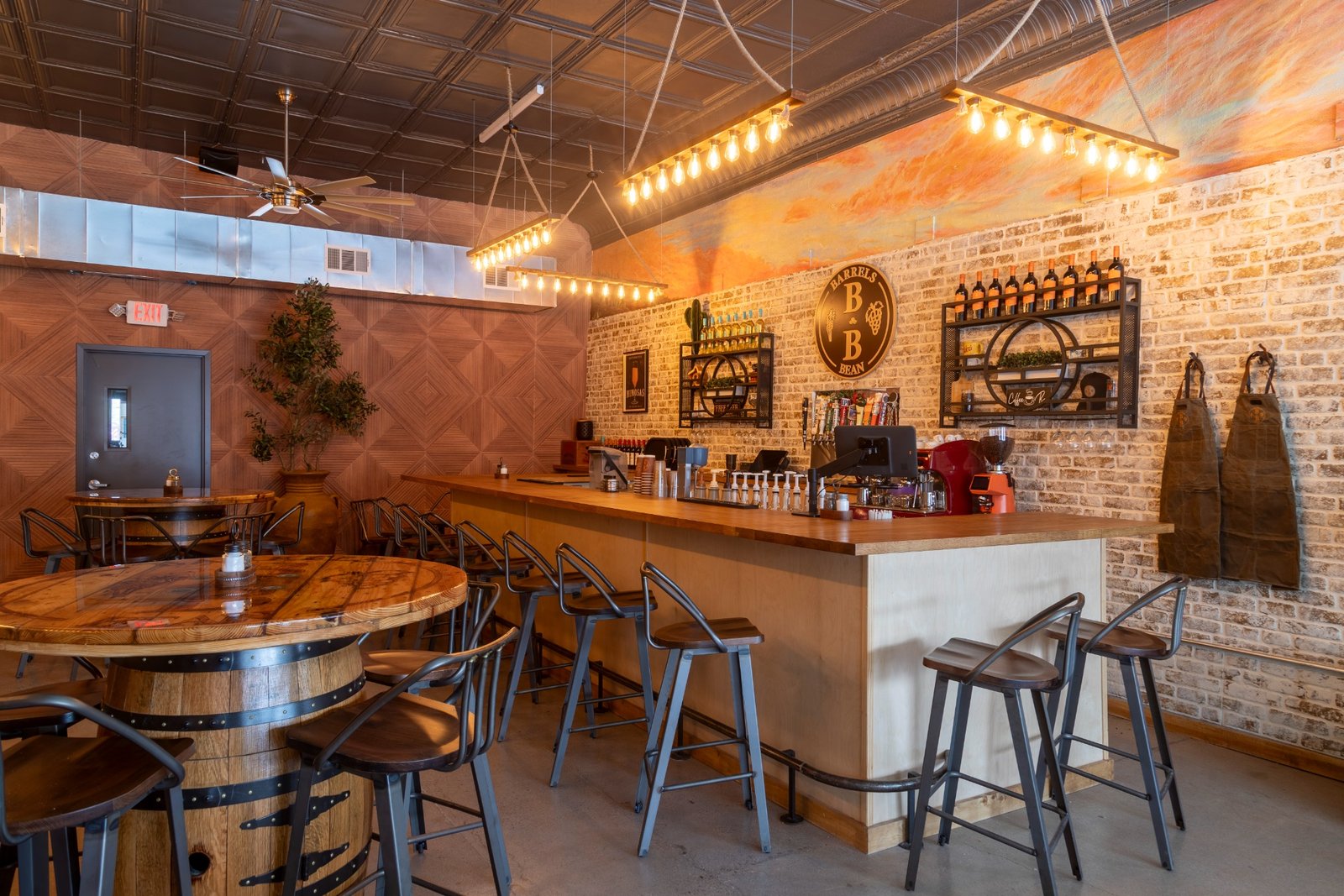 Wide view of the Barrels & Bean bar and barrel seating