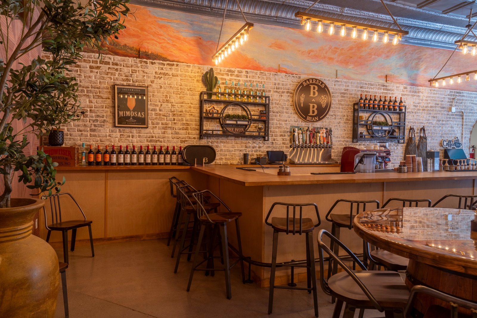 Closer look at the bar, tap wall and interior shelves at Barrels & Bean