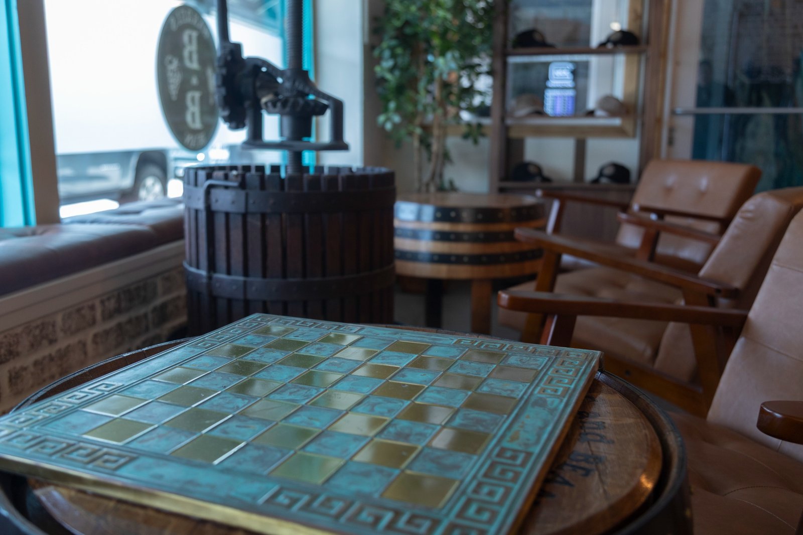Lounge seating and barrel table detail inside Barrels & Bean